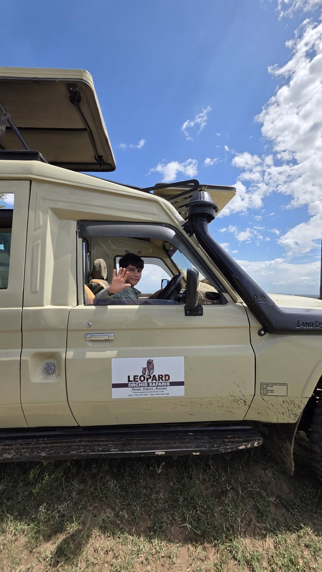 Two safari vehicles on morning game drive
